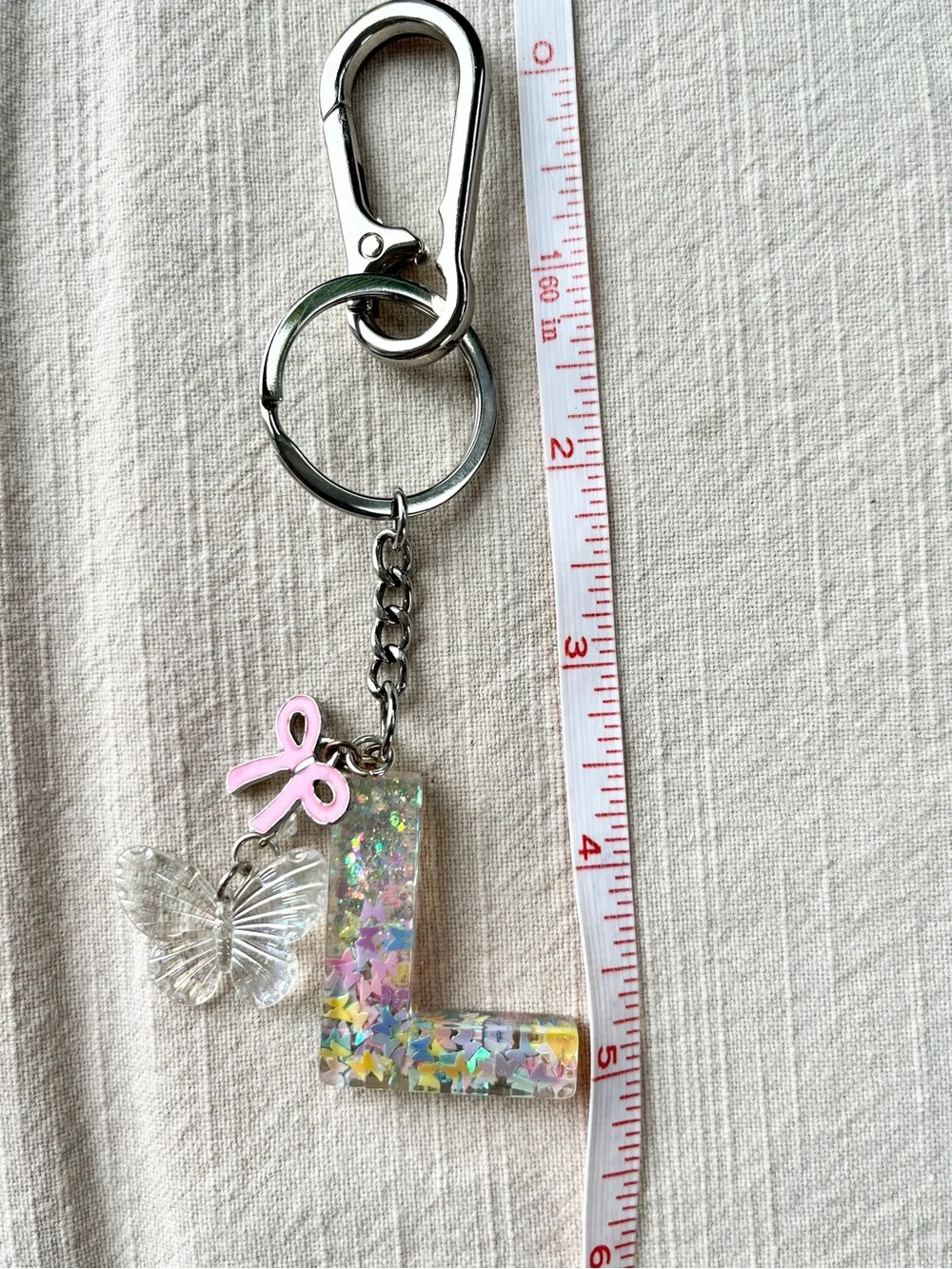 🦋 'L' Glitter Letter Keychain & Bag Charm with 🎀 Bow & Butterfly Accents